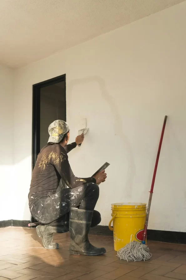 man making repairs in his house. home renovation.